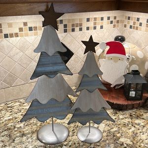 Two metal and wooden Christmas trees. One is 7”x15”, one is 9”x19”. 🎄🎄